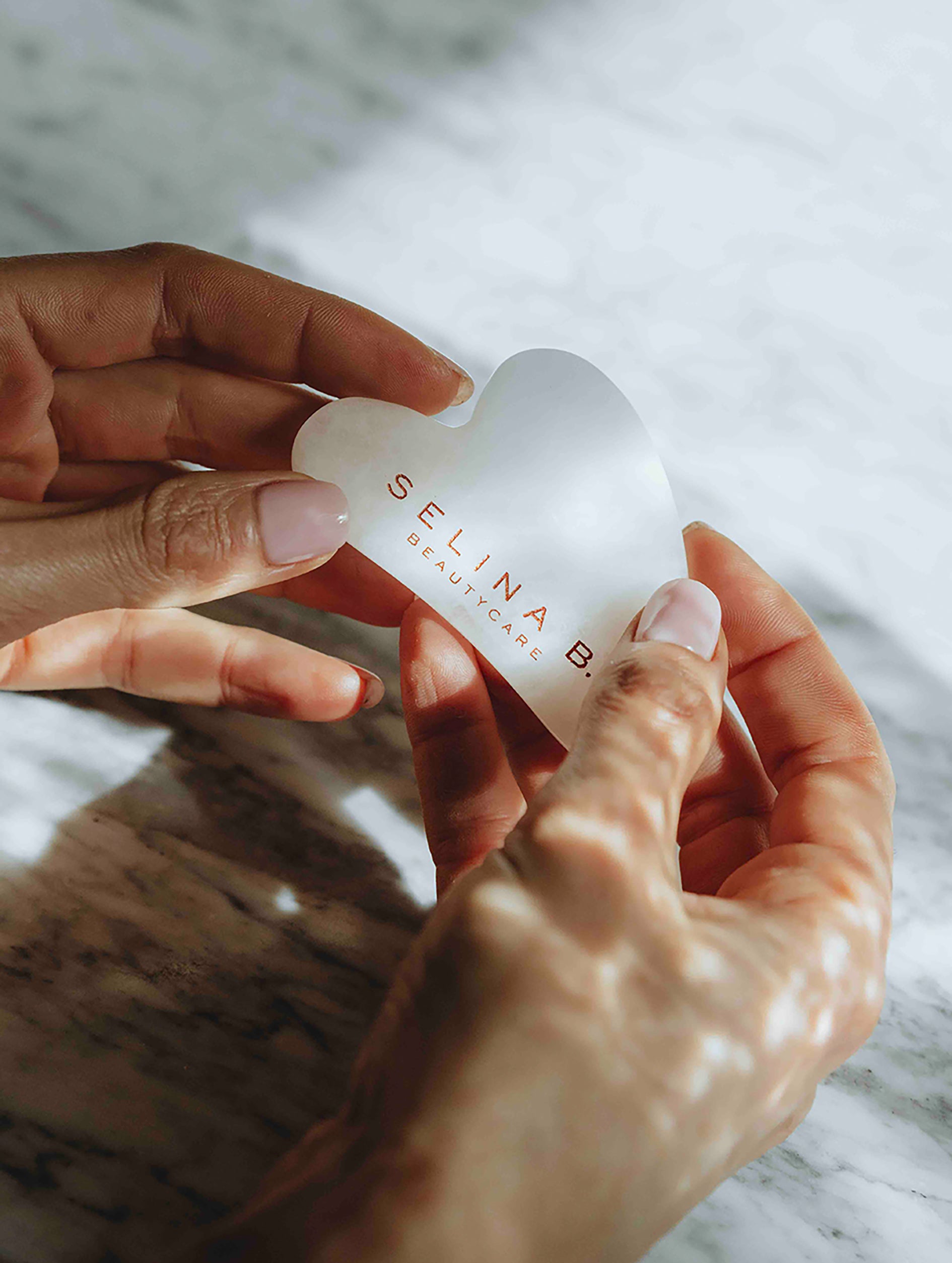 Gua Sha face massage tool